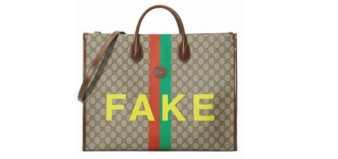 fake not gucci|The Gucci Fake Not motif makes an ironic statement .